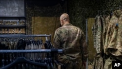 A soldier shops at a military store in Kramatorsk, Ukraine, Sept. 13, 2023.