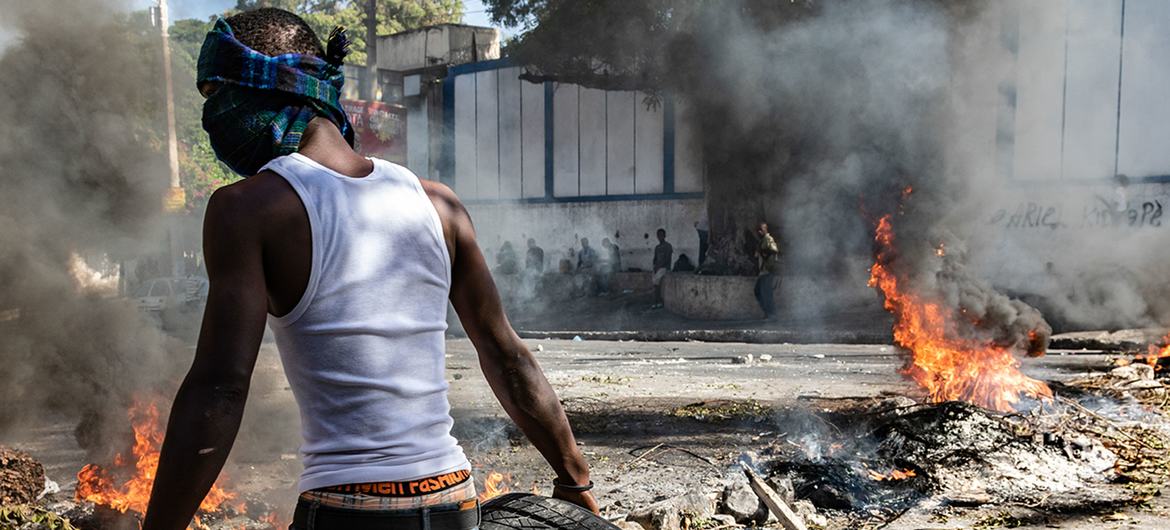 People protest on the streets of Port-au-Prince in crisis-torn Haiti.