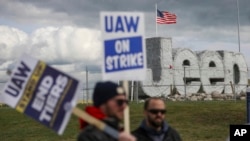 The UAW and Stellantis have come to a preliminary agreement on a contract, with the union also calling for a strike at a GM factory.