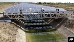 Installing solar panels above the canals in the Gila River Indian Community will aid in water conservation.