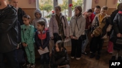 Region


Parents in Ukraine's Kherson Region are grappling with a difficult decision - to stay or to leave.