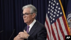 The Federal Reserve has chosen to maintain the current interest rate, while also leaving the option open for a potential increase.