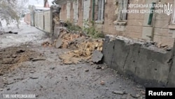Damage to a building is seen after a reported deadly Russian artillery strike in Kherson, Ukraine, in this still image from handout video released Nov. 20, 2023. (Kherson Regional State Administration/Handout via Reuters)