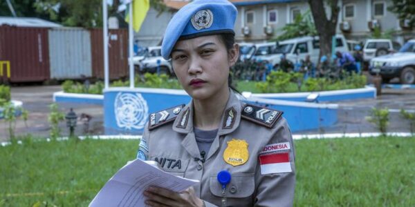 The United Nations' leading female law enforcement officer is described as a youthful catalyst for transformation.