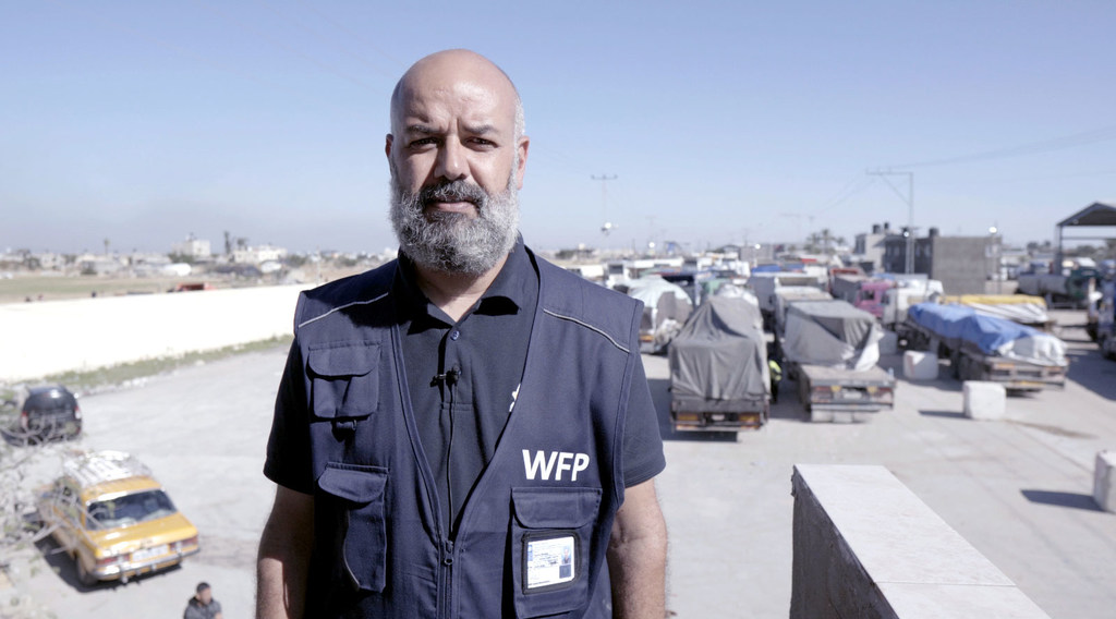 Ayman Shublaq, a World Food Programme staff member while supporting in the transshipment area near Rafah crossing.