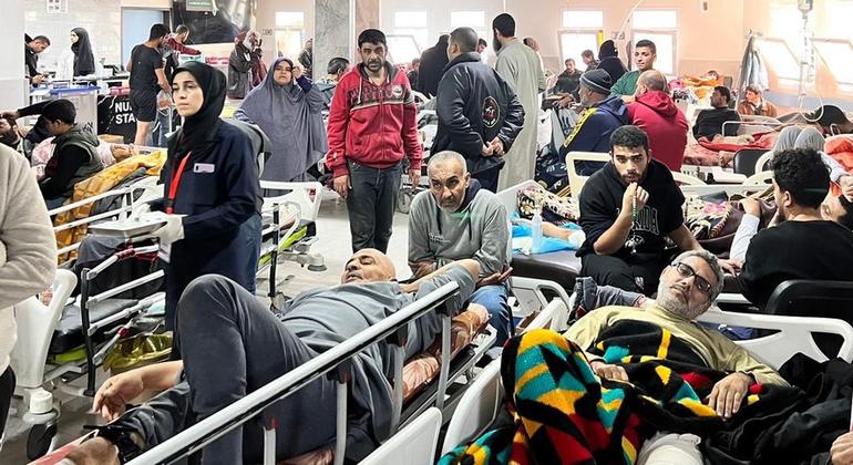 UN employees providing assistance to a hospital in Gaza report a chaotic and overwhelming emergency department, describing it as a scene of carnage.