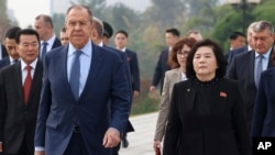 FILE - In this photo released by Russian Foreign Ministry Press Service, Russian Foreign Minister Sergey Lavrov, left, and North Korean Foreign Minister Choe Son Hui, right, attend a ceremony in Pyongyang, North Korea, Oct. 19, 2023.