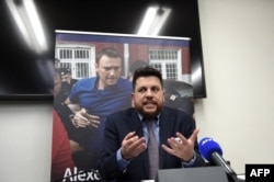 FILE - Leonid Volkov, who has served as Alexey Navalny's top strategist, speaks during an interview at the European Parliament in Strasbourg, France, Dec. 14, 2021. On Tuesday, Volkov was attacked near his home in Lithuania.