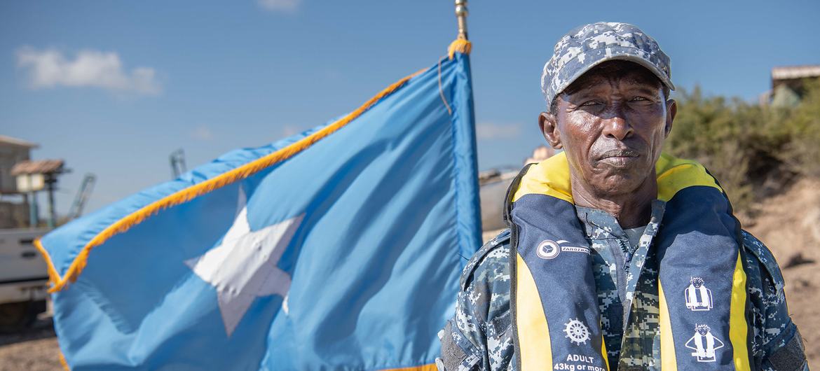 A Somali coast guard crew member at the launch of a patrol boat near Mogadishu.