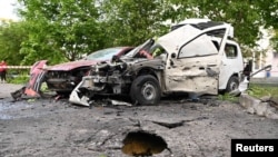 A view shows cars damaged by shelling, what local authorities called a Ukrainian military strike, in the course of the Russia-Ukraine conflict in Belgorod, Russia, May 14, 2024. Mayor of Belgorod City Valentin Demidov via Telegram/Handout via REUTERS