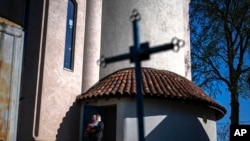 In Ukraine, damaged church rises as a symbol of faith, culture