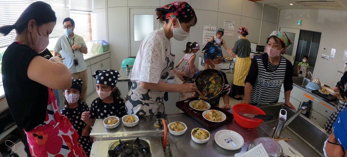 Residents of Okinoerabu Island prepare local delicacies.