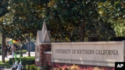 The name for the University of Southern California is displayed at a campus entrance in Los Angeles, April 16, 2024.