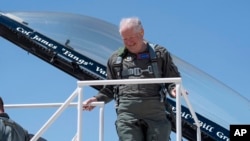 US Air Force Secretary Frank Kendall smiles after a test flight of the X-62A VISTA aircraft against a human-crewed F-16 aircraft in the skies above Edwards Air Force Base, Calif., on May 2, 2024.