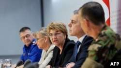 Swiss President Viola Amherd, center, speaks during a press conference ahead of the Ukraine peace conference organized by Switzerland, in Bern on June 10, 2024.