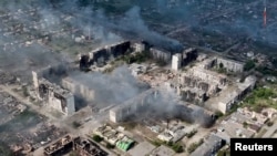 A drone view shows damaged buildings, amid Russia's attacks on Ukraine, in Vovchansk, Kharkiv region, Ukraine, in this screen grab from video released on June 2, 2024. (United Assault Brigade of the National Police of Ukraine 