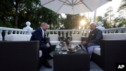 In Moscow, India's Modi calls for peace, decries 'heart-wrenching' death of children