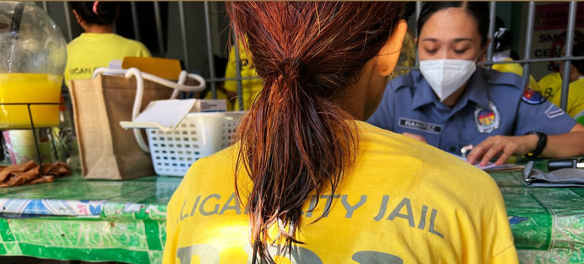 A woman at Iligan City Jail has a health consultation.