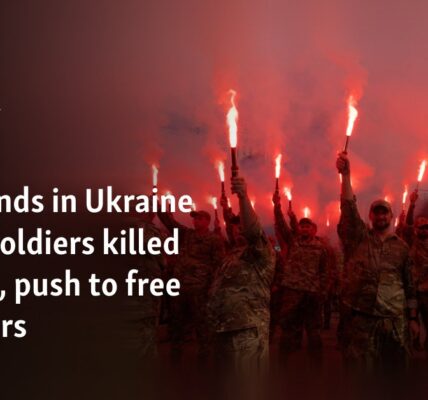 Thousands in Ukraine honor soldiers killed in blast, push to free prisoners