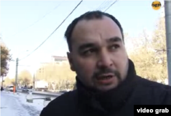 Tim Stigal tells Russia's REN TV channel about the anti-drug project “Pharmacies Without Narcotics” in Makhachkala, Dagestan in November 2011, in this image taken from REN TV video.