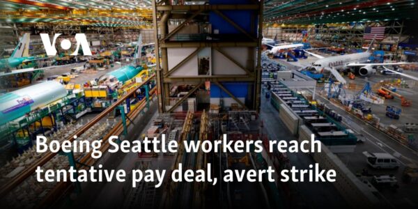 Boeing Seattle workers reach tentative pay deal, avert strike