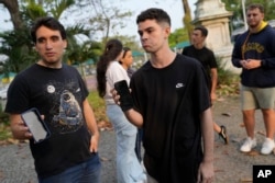 University students show their phone screens after social media platform X was blocked nationwide, in Rio de Janeiro, Sept. 2, 2024.