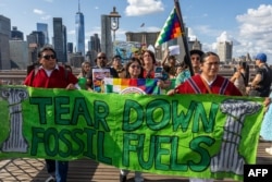 Climate protesters say pace of change isn't fast enough