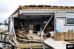 An exposed interior view of a damaged house is seen after Hurricane Helene made landfall in Horseshoe Beach, Florida, on Sept. 28, 2024.