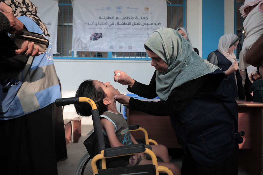 A child receives the polio vaccine in Gaza.