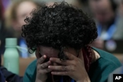 An attendee reacts during the closing plenary session at the COP29 U.N. Climate Summit in Baku, Azerbaijan, Nov. 24, 2024.