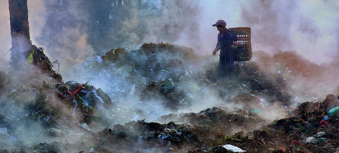 A girl scavenges for recyclable materials at a garbage dump in Mandalay, Myanmar’s second-largest city, where impoverished families are often forced to search for items to sell for minimal income. (file)