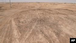 Spy satellite images leads to the site of a historic battle in Iraq