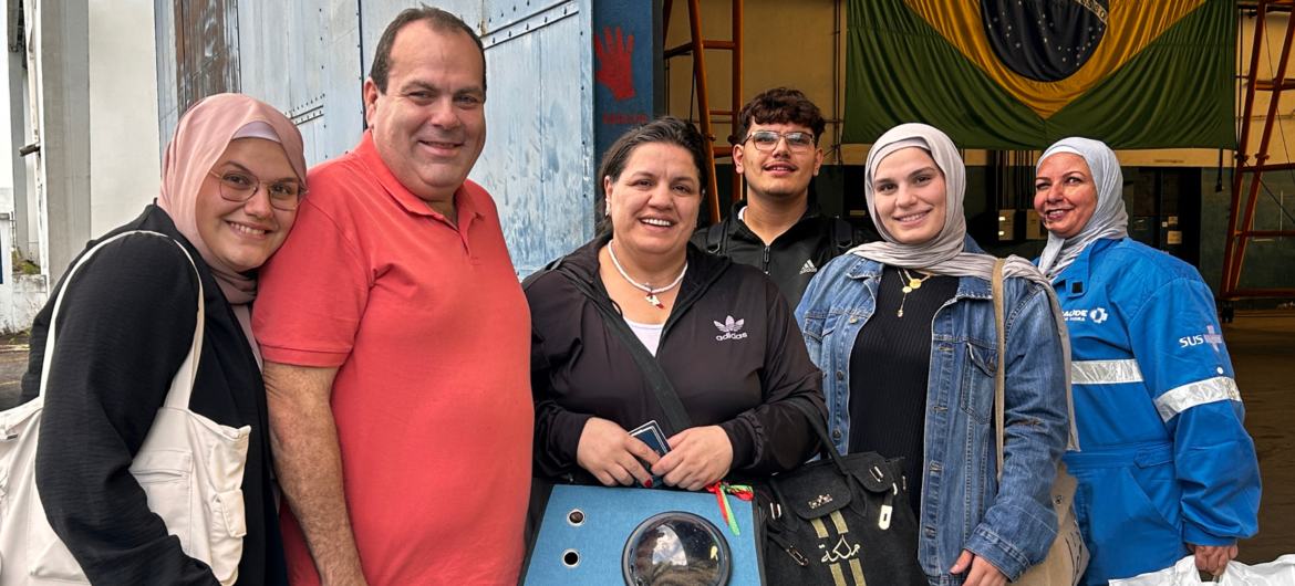 Brazilian Nura Yassine (second from right) who lived in Lebanon for 16 years, reunites with her family in Brazil