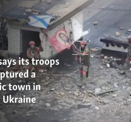 Russia says its troops have captured a strategic town in eastern Ukraine