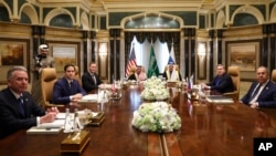 FILE - U.S., Saudi and Russian officials meet at Diriyah Palace, in Riyadh, Saudi Arabia, Feb. 18, 2025. Second left is U.S. Secretary of State Marco Rubio, with Russian Foreign Minister Sergey Lavrov at right.