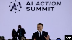 On sidelines of AI Summit in Paris, unions denounce its harmful effects