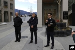 Toyota executives in charge of Woven City, from left to right, Woven by Toyota CFO Kenta Kon, CEO Hajime Kumabe and Head of Woven City Management Daisuke Toyoda speak to reporters about the first phase construction of the project in Susono, Feb. 22, 2025.