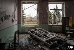 FILE - A school classroom sits destroyed by shelling in the village of Dachne on Nov. 13, 2024, near the front lines in the Russian invasion of Ukraine. Russian forces continue to encroach in the lithium-rich area of the Kurakhove region.