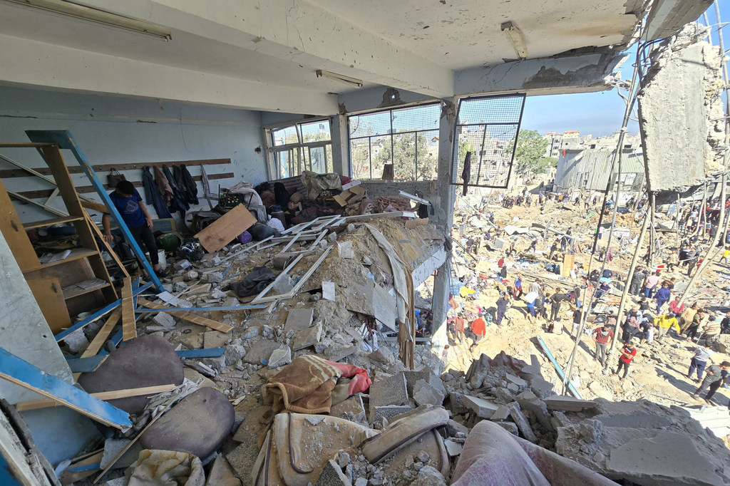 Aftermath of a 6 May Israeli airstrike on an UNRWA school turned shelter in Al Bureij, Gaza where 30 people were reported killed, among them women and children. Aftermath of a 6 May Israeli airstrike on an UNRWA school turned shelter in Al Bureij, Gaza where 30 people were reported killed, among them women and children.