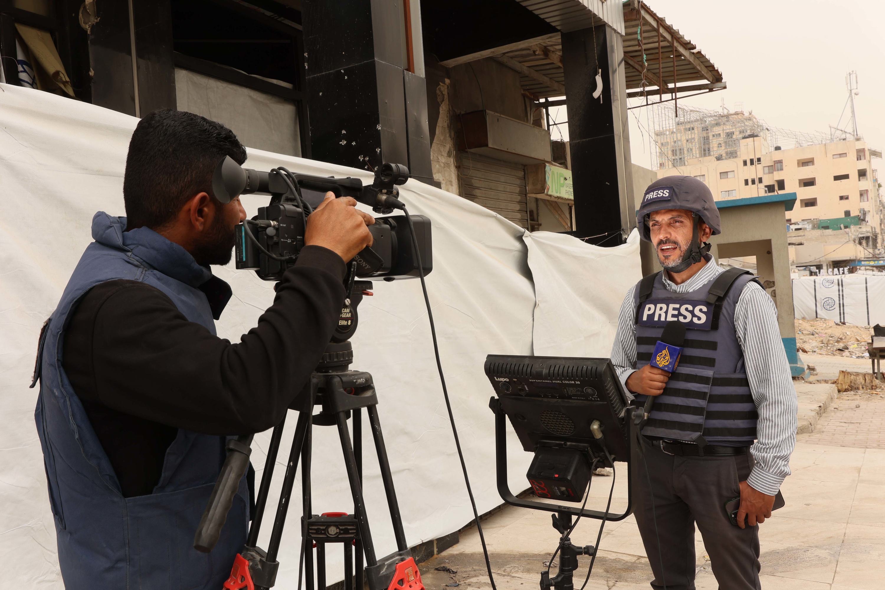 Palestinian journalist, Moamen Sharafi (right,) lost several family members during the current war that started in October 2023. Palestinian journalist, Moamen Sharafi (right,) lost several family members during the current war that started in October 2023.